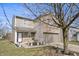 Charming two-story home with a brick and siding exterior, complemented by a well-maintained front yard at 8926 Poppy Ln, Indianapolis, IN 46231