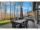 Outdoor dining on a spacious deck offers a blend of comfort and style, perfect for entertaining or enjoying serene backyard views at 9334 Seascape Dr, Indianapolis, IN 46256