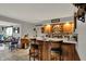 Finished basement features a wet bar, comfortable seating, and a stylish design at 9334 Seascape Dr, Indianapolis, IN 46256