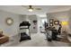 Bonus room featuring a treadmill, home office, and ceiling fan at 9334 Seascape Dr, Indianapolis, IN 46256