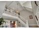 Bright living area showcasing the upstairs landing, vaulted ceilings and stylish decor at 9334 Seascape Dr, Indianapolis, IN 46256