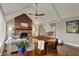 Inviting living room featuring a brick fireplace, hardwood floors, and stylish furnishings at 9334 Seascape Dr, Indianapolis, IN 46256