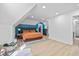 Stylish bedroom with a cozy rug, chair, and natural light, plus easy access to a spacious closet at 935 N Tacoma Ave, Indianapolis, IN 46201