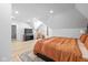 Well-lit bedroom featuring a plush bed, cozy rug, and bright windows, creating a relaxing atmosphere at 935 N Tacoma Ave, Indianapolis, IN 46201