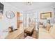 Comfortable living room with hardwood floors, stylish decor, and an open doorway to dining area at 935 N Tacoma Ave, Indianapolis, IN 46201