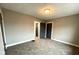 Comfortable bedroom with neutral colors and new carpet, creating a relaxing retreat at 950 N Rural St, Indianapolis, IN 46201