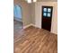 Beautiful living room featuring new floors and an archway, creating an inviting space at 950 N Rural St, Indianapolis, IN 46201