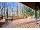 Spacious deck with beautiful natural wood finishes and built-in seating at 98 Highland Manor S Ct, Indianapolis, IN 46228