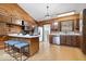 Charming kitchen with wood accents, stainless steel appliances, and an open layout at 98 Highland Manor S Ct, Indianapolis, IN 46228