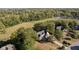 Serene aerial view of a home nestled among lush trees and greenery at 1143 N Sugar Bend Run, Greenfield, IN 46140