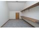 Attic space with carpeting and shelving at 1143 N Sugar Bend Run, Greenfield, IN 46140