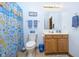 Charming bathroom with a vanity, and a shower featuring a colorful fish-themed shower curtain at 1143 N Sugar Bend Run, Greenfield, IN 46140