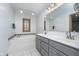 Bright bathroom featuring a jacuzzi tub and a double vanity with storage at 1143 N Sugar Bend Run, Greenfield, IN 46140