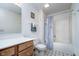 Bathroom featuring a tiled floor, a sink, a toilet, and a shower at 1143 N Sugar Bend Run, Greenfield, IN 46140