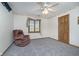 Bedroom with plush carpeting, a ceiling fan, and an exterior window at 1143 N Sugar Bend Run, Greenfield, IN 46140