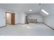 Bonus room featuring an open floor plan, skylights, and carpeted floors at 1143 N Sugar Bend Run, Greenfield, IN 46140