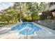 Inviting backyard swimming pool with slide and diving board, perfect for summer fun at 1143 N Sugar Bend Run, Greenfield, IN 46140