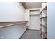 Walk-in closet providing ample storage with adjustable shelving and ample lighting at 1143 N Sugar Bend Run, Greenfield, IN 46140