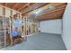 Unfinished basement featuring exposed ceiling and walls, with open layout and carpet flooring, ready for customization at 1401 Shadow Ct, Zionsville, IN 46077