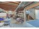Spacious unfinished basement shows exposed ductwork, wooden beams, and is ready for storage or transformation at 1401 Shadow Ct, Zionsville, IN 46077