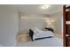 Bright bedroom with neutral walls, carpet, a twin daybed, and built-in shelves at 1401 Shadow Ct, Zionsville, IN 46077