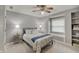 Comfortable bedroom with neutral walls, carpet, a window seat, and built-in shelving at 1401 Shadow Ct, Zionsville, IN 46077