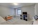 Spacious neutral bedroom with plush carpet, large window seat, and built-in organizers at 1401 Shadow Ct, Zionsville, IN 46077