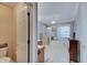 Bathroom with tub, separate shower, and vanity with cabinets, all brightly lit by natural light at 1401 Shadow Ct, Zionsville, IN 46077