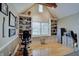 Bright office with built-in bookshelves, a vaulted ceiling, and ample natural light, perfect for work or study at 1401 Shadow Ct, Zionsville, IN 46077