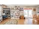 Cozy living room with natural light, complemented by laminate floors and thoughtful decor at 142 Norbeck Ter, Indianapolis, IN 46217