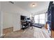 Bright bedroom with an office setup, carpeted floor, and a closet space at 14241 Antiquity Dr, Carmel, IN 46033