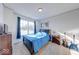 Comfortable bedroom with window, wood furnishings, and decorative guitars for a unique touch at 14241 Antiquity Dr, Carmel, IN 46033