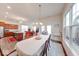 Spacious dining room with a table and view to the kitchen and living room at 14241 Antiquity Dr, Carmel, IN 46033