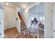 Inviting foyer with hardwood floors leading to the living and dining areas at 14241 Antiquity Dr, Carmel, IN 46033