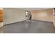 Spacious basement area featuring durable flooring, access to laundry, and stairs leading to the upper level at 1585 S 600 W, New Palestine, IN 46163