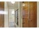 Full bathroom featuring a glass door shower over tub and convenient towel racks at 1585 S 600 W, New Palestine, IN 46163