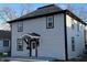 Attractive two-story home with updated siding and a welcoming front porch, perfect for families at 1809 S H St, Elwood, IN 46036