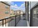 Balcony view shows townhomes, landscaping, and community space at 1842 Central Ave, Indianapolis, IN 46202