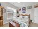 Charming bedroom with a full bed, ample window space, and natural light at 1842 Central Ave, Indianapolis, IN 46202