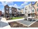 Well-maintained common area within a townhouse complex, including seating areas, landscaping, and inviting walkways at 1842 Central Ave, Indianapolis, IN 46202