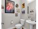 Stylish powder room with modern fixtures, trendy decor, and a clean design, ideal for guests at 1842 Central Ave, Indianapolis, IN 46202