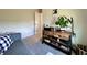 Cozy home office space with a plush sofa, rustic furniture and warm natural light at 1862 Cascades Dr, Greenfield, IN 46140