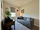 Comfortable office features soft light, cozy seating, and rustic wood furniture at 1862 Cascades Dr, Greenfield, IN 46140
