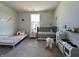 A spacious Bedroom with twin beds, green crib, rocking lamb, and play kitchen at 1862 Cascades Dr, Greenfield, IN 46140