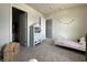 Neutral-toned bedroom featuring a day bed, dollhouse and closet with plenty of storage at 1862 Cascades Dr, Greenfield, IN 46140
