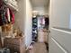 Well-organized walk-in closet featuring shelving units, hanging racks and convenient storage options at 1862 Cascades Dr, Greenfield, IN 46140