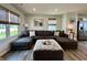 Stylish living room showcasing a large sectional sofa, decorative pillows, and elegant decor at 1862 Cascades Dr, Greenfield, IN 46140