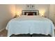 A welcoming primary bedroom with a comfortable bed and soft lighting at 1862 Cascades Dr, Greenfield, IN 46140