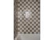 Close-up of shower tile with gray and white checkered pattern at 19909 Windsor Park Blvd, Westfield, IN 46069