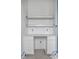 A clean, built-in desk area with white cabinets, shelving and quartz countertop at 19909 Windsor Park Blvd, Westfield, IN 46069